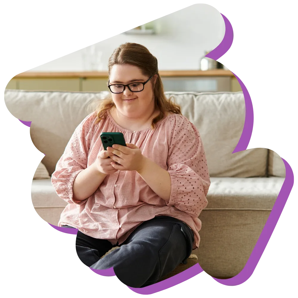 Disabled woman with down syndrome making phone call