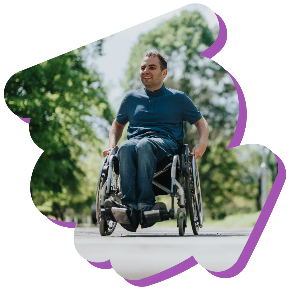 Disabled man in wheelchair outside