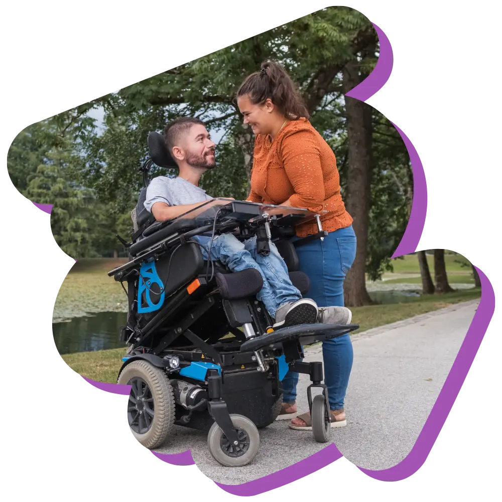 Happy disabled man smiling with girlfriend