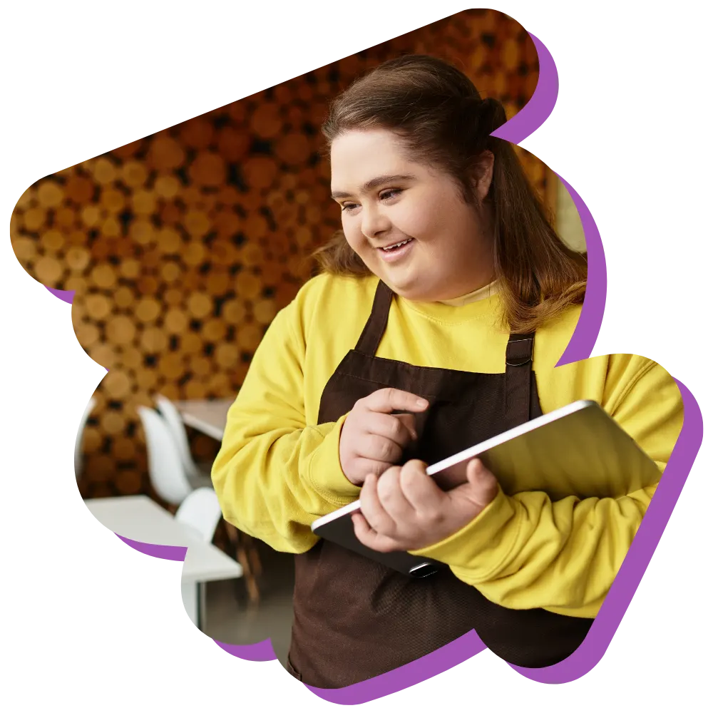 Disabled woman with down syndrome working at cafe